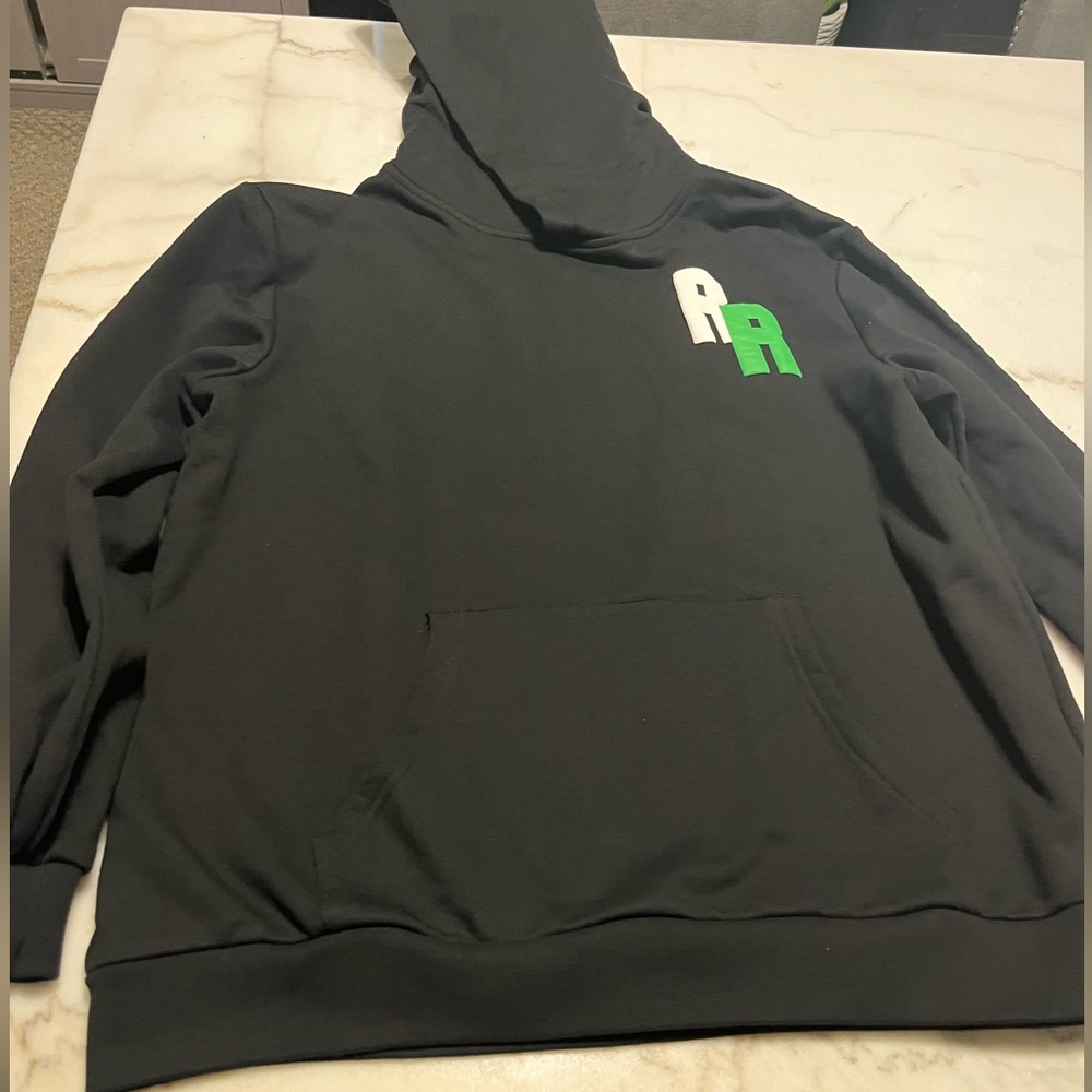 Black Hoodie with Green and White Accents
